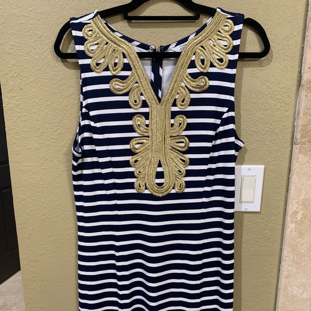 Stripped dress with gold collar detail